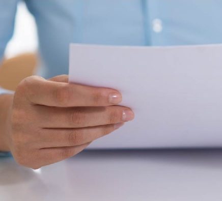 closeup of person reading document