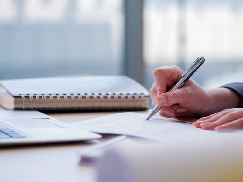 businesswoman,working,at,her,desk,in,office